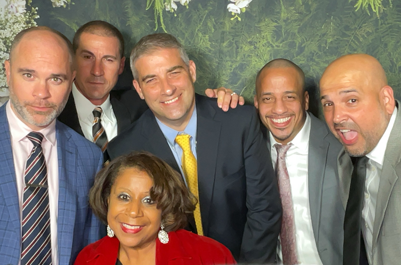 group of men and one woman